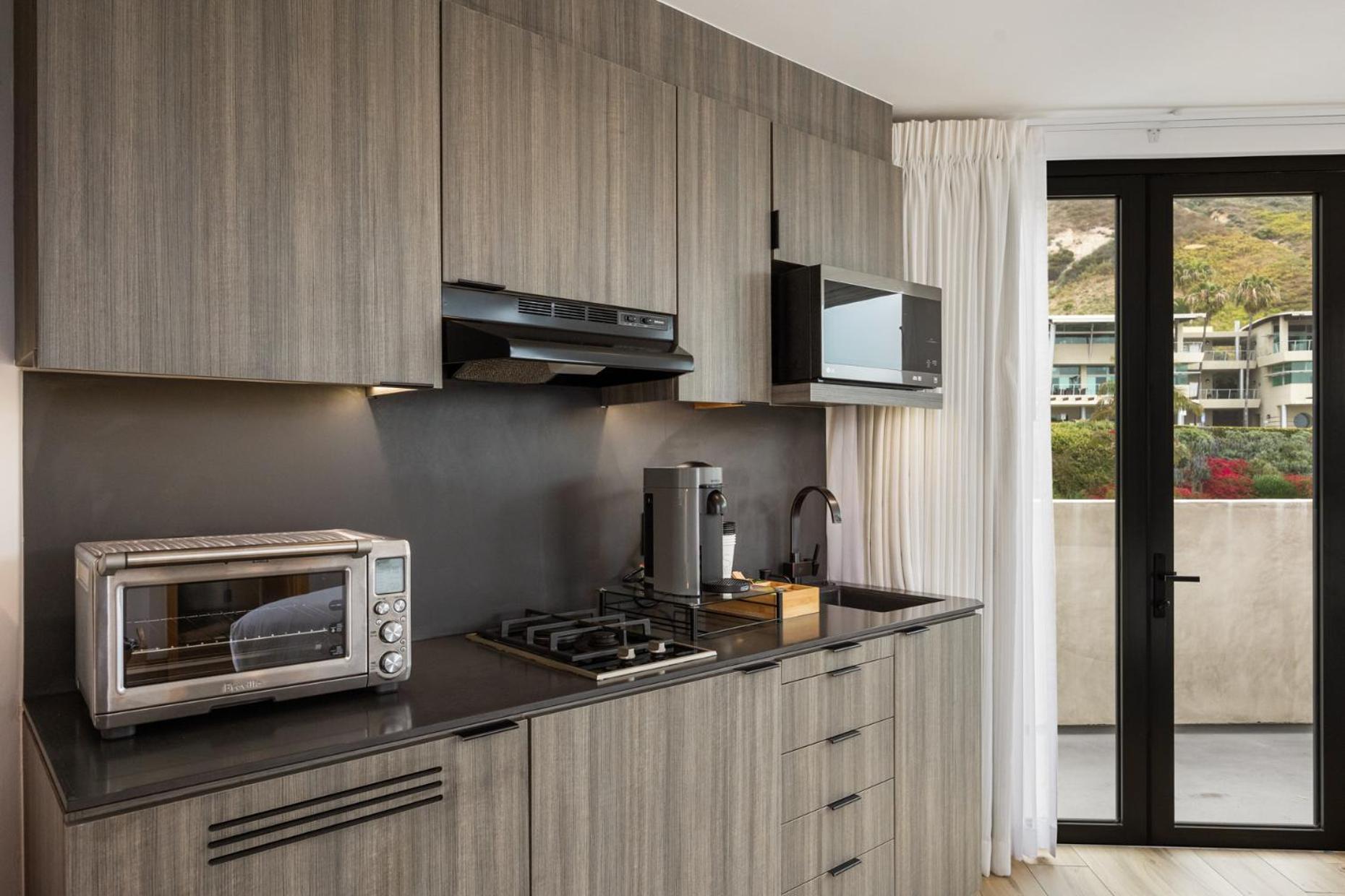 Malibu Sand Carbon Beach Suites Bagian luar foto